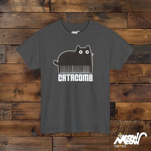Catacomb Pun Unisex T-Shirt, Funny Hairdresser Cat Tee Dark Heather
