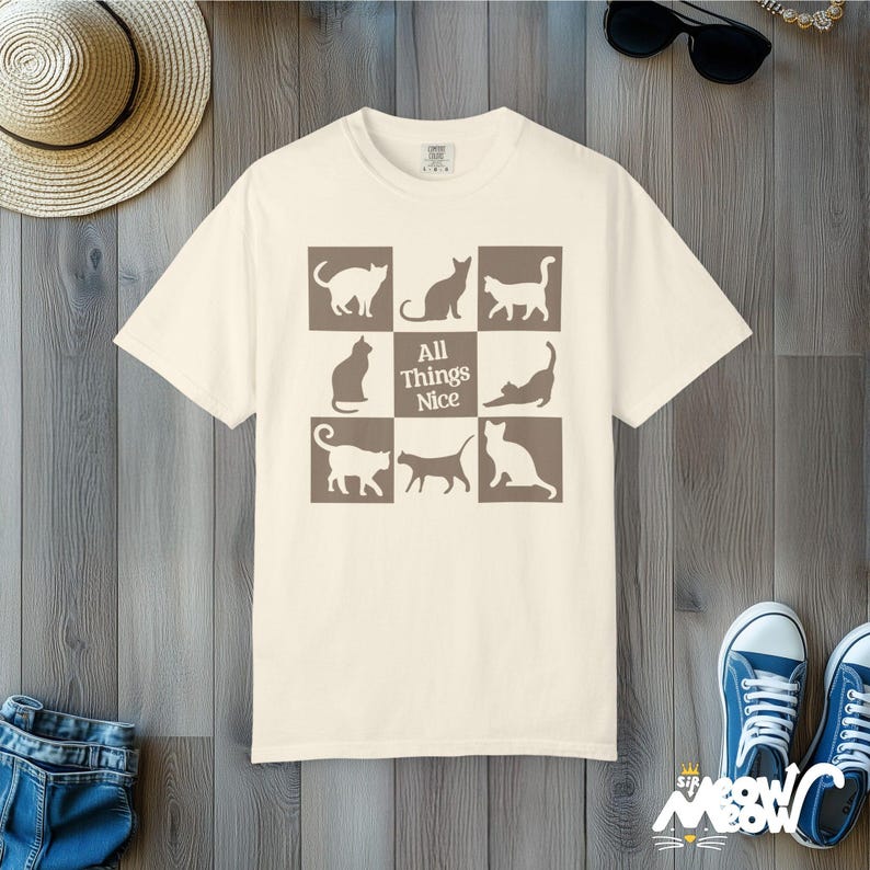 Minimalistyczna koszulka z sylwetką kota: Komfortowa koszulka unisex Ivory