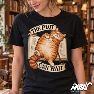 The Plot Can Wait Cat T-Shirt, Ginger Tabby on Book, Book Lover Gift image 1