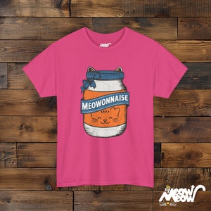 May include: Pink t-shirt with a graphic of a jar of "MEOWONNAISE" with a cat face on the label.