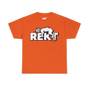 Orange unisex T-shirt featuring humorous white “REKT” text topped with an illustration of an exhausted cat lying sprawled out, capturing gamer and meme culture vibes.