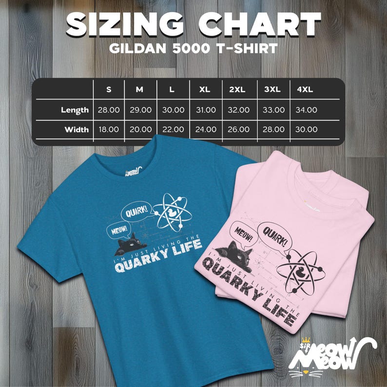 May include: A teal blue and pink t-shirt with a black cat graphic and the text "I'm just living the quirky life" and "Meow!" and "Quark!" printed on the front. The t-shirt is available in sizes S-4XL. A sizing chart is included in the image.