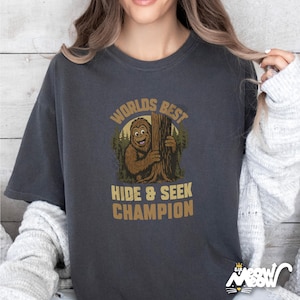 Comfort Colors Bigfoot Hide and Seek Champion T-Shirt, Funny Sasquatch Tee for Cryptid Fans, Outdoor Hiking Gift