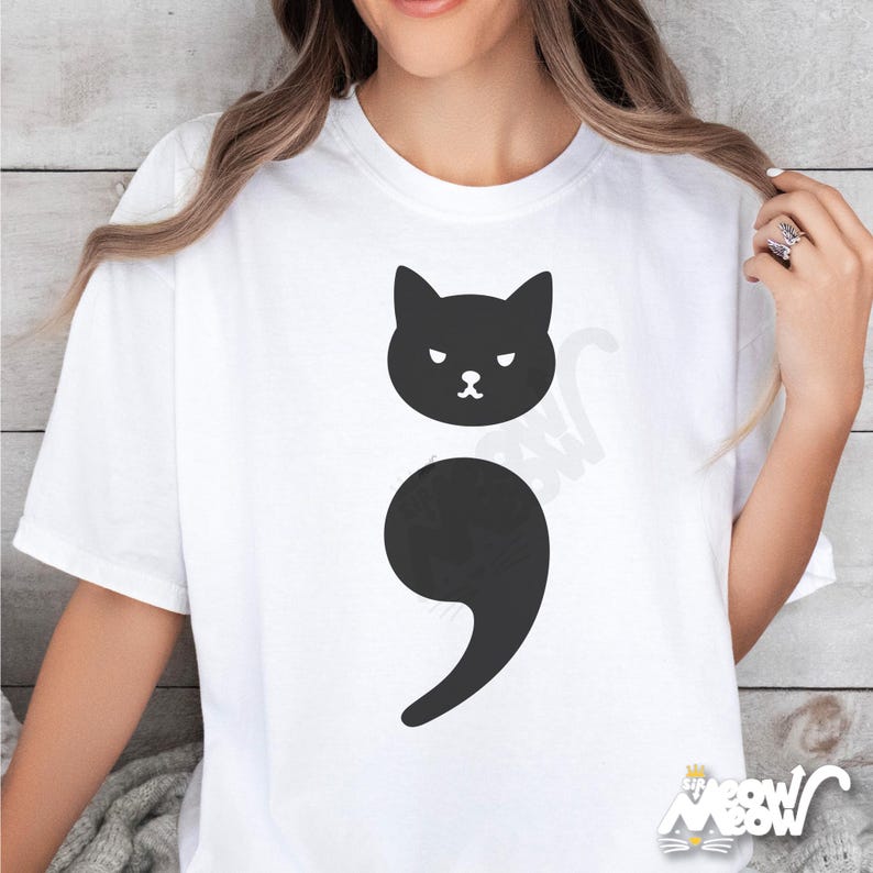 Minimalist cat in semicolon shape on Comfort Colors tee, symbolizing mental health and grammar humor