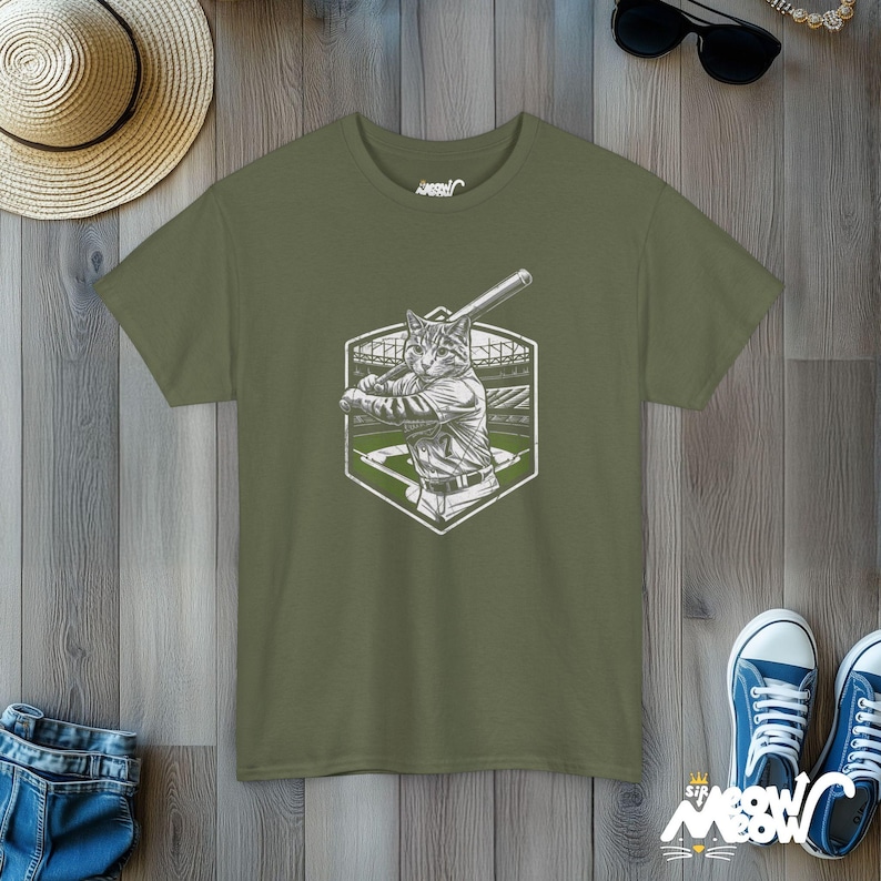 Funny Softball Cat Graphic T-Shirt: Quirky Sports Apparel Military Green