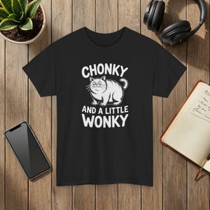 Funny Cat T-Shirt: Chonky, Wonky-Eyed Graphic Tee Black