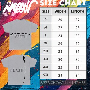 Peut inclure: Tableau des tailles pour un t-shirt avec des mesures en pouces. Le tableau indique la largeur et la longueur du t-shirt en pouces pour les tailles S, M, L, XL, 2XL, 3XL, 4XL et 5XL.