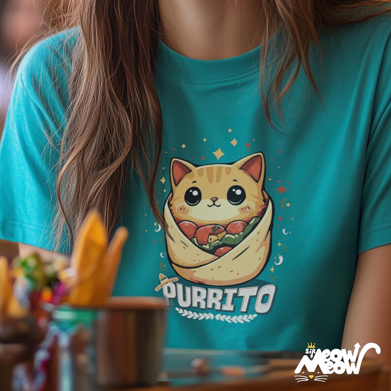 May include: A turquoise blue t-shirt featuring a cartoon cat wrapped in a burrito. The cat is wearing a sombrero and the text "purrito" is below the cat. The text "Sir Meow Meow" is in the bottom right corner of the image.