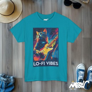 Lo-Fi Vibes Cat T-Shirt: Retro Music Graphic Tee Tropical Blue