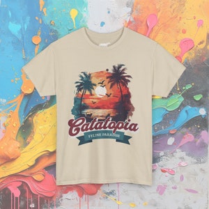 Catatopia T-Shirt, Tropical Cat Paradise Tee, Feline Lover Beach Shirt, Casual Vacation Top Sand