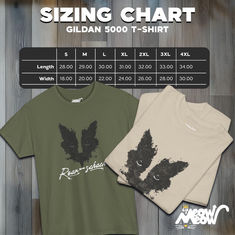 May include: A sizing chart for Gildan 5000 T-shirts, showing measurements in inches for length and width, for sizes S through 4XL. The chart is displayed on a wooden background. Two T-shirts are shown below the chart, one in olive green and one in beige, both featuring a black and white graphic of a cat's face.