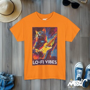 Lo-Fi Vibes Cat T-Shirt: Retro Music Graphic Tee Safety Orange