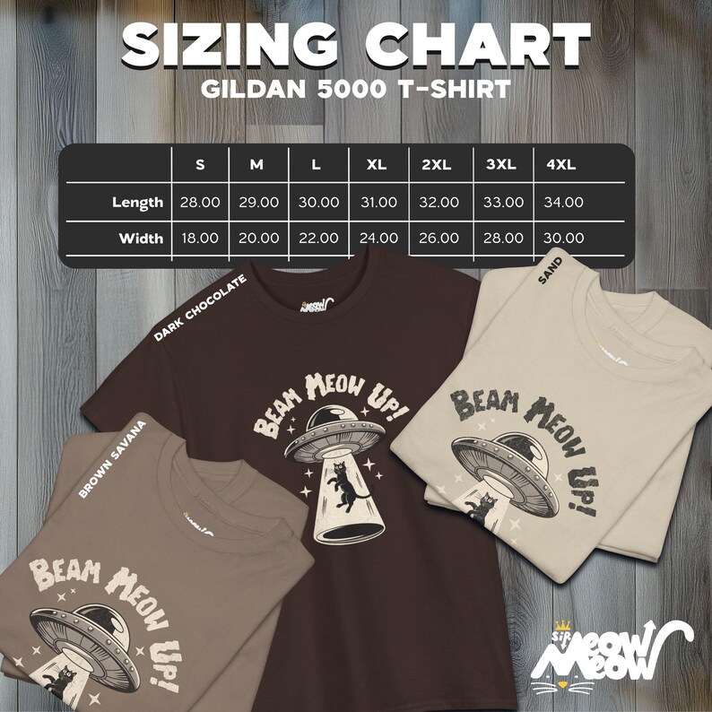 May include: A sizing chart for Gildan 5000 t-shirts with measurements in inches. The chart shows the length and width of the shirts in sizes S, M, L, XL, 2XL, 3XL, and 4XL. The image also shows three t-shirts with a graphic of a cat in a UFO with the text "Beam Meow Up!" printed on them. The t-shirts are in the colors brown, tan, and sand.
