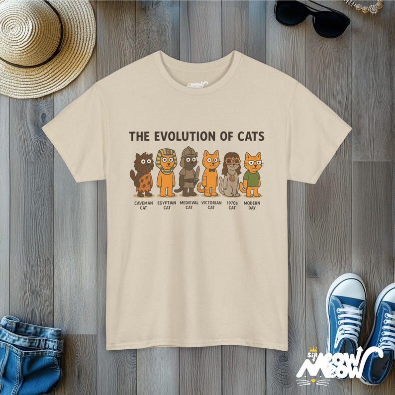 Evolution of Cats T-Shirt: Funny History Timeline Graphic Tee Sand