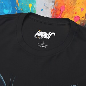 May include: Black t-shirt with a white label that says "Sir Meow" with a crown above the word "Meow". The label also says "100% Cotton" and "Made in Dominican Republic".