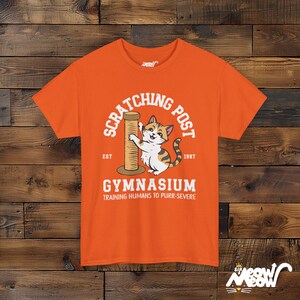 Funny Cat Training T-Shirt: Scratching Post Gymnasium Unisex Tee Orange