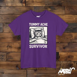 Tummy Ache Survivor Cat Shirt: Funny Unisex Graphic Tee Purple
