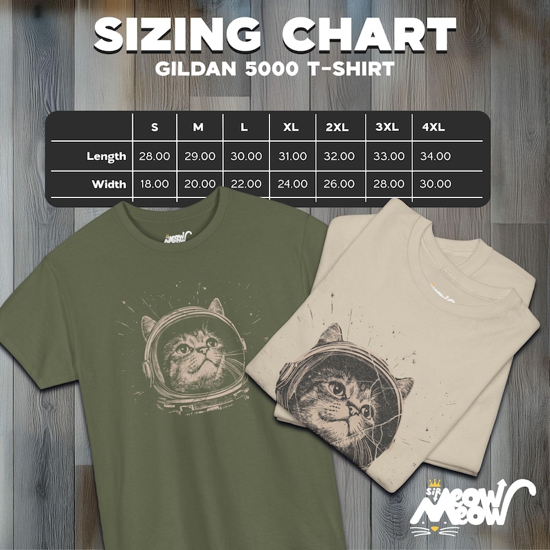May include: Sizing chart for Gildan 5000 T-shirts, showing measurements in inches for length and width, for sizes S through 4XL. The chart is displayed on a wooden surface with two t-shirts featuring a cat in a space helmet graphic.
