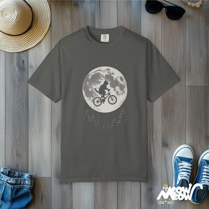 Comfort Colors Cat Moon T-Shirt: Flying Cat on Bike Graphic Tee Pepper