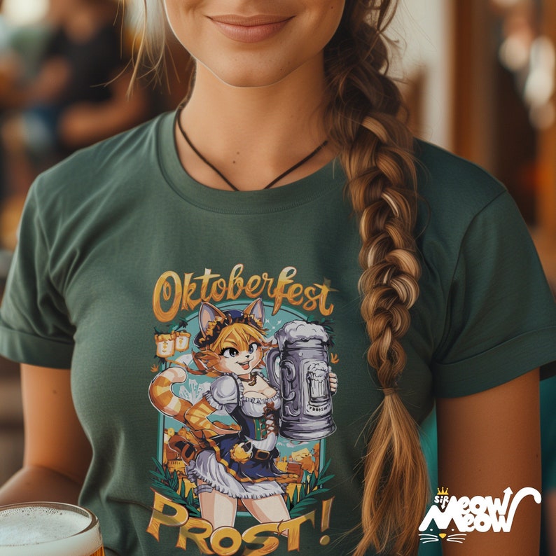 May include: A green t-shirt with a cartoon illustration of a cat wearing a dirndl and holding a stein of beer. The text "Oktoberfest Prost!" is printed on the shirt.