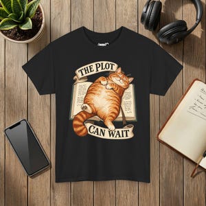 The Plot Can Wait Cat T-Shirt, Ginger Tabby on Book, Book Lover Gift Black