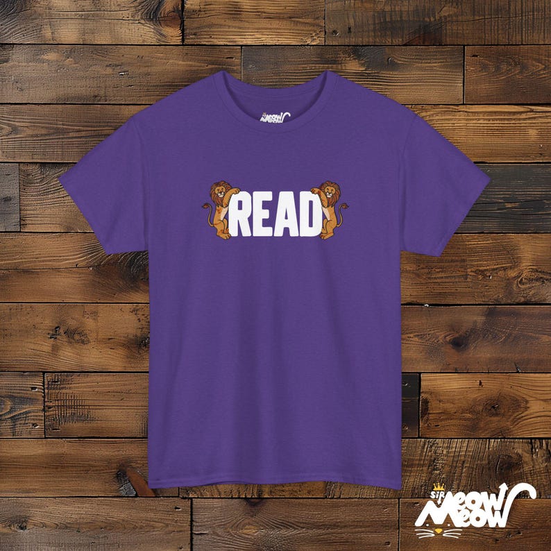 READ Between the Lions T-Shirt: Literacy Pun Gift Lilac