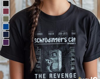 May include: Black t-shirt with a white graphic of a cat in a box with the text "Schrödinger's Cat Episode V The Revenge".