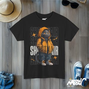 Humanized British Shorthair Cat standing up wearing a yellow hoodie and white and gray sneakers. Behind the cat is a stack of the word "Shorthair". The design appears on a woman wearing a black tee.