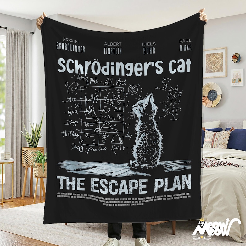 May include: Black and white throw blanket featuring a cat illustration and the text "Schr&ouml;dinger's cat" and "The Escape Plan". The blanket depicts a white cat with a black tail against a backdrop of black and white equations.