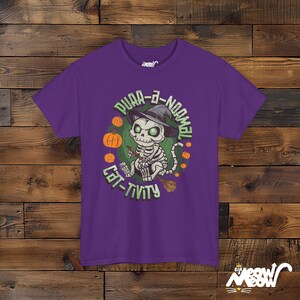 Purr-A-Normal Cat-Tivity Skeleton Cat Halloween Unisex Shirt, Fun Witchy Cat Design Purple