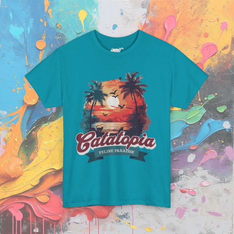 Catatopia T-Shirt, Tropical Cat Paradise Tee, Feline Lover Beach Shirt, Casual Vacation Top Tropical Blue