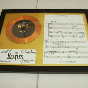 the Beatles gesigneerd display