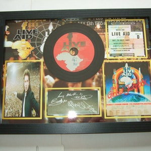 u2 live aid   signed display