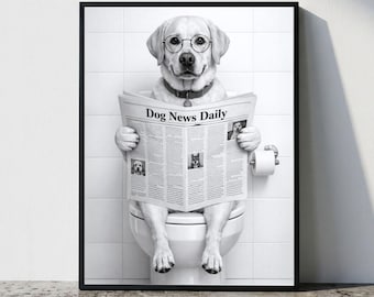 May include: A black and white framed wall art print featuring a Labrador dog wearing round glasses and a collar, sitting on a white toilet while reading a newspaper titled Dog News Daily. The background consists of white square bathroom tiles.