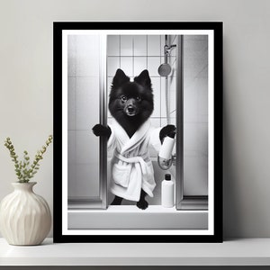 May include: A black dog wearing a white bathrobe stands in a shower stall, holding a bottle of shampoo. The dog is looking at the camera.