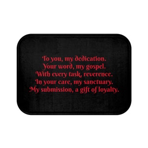 May include: Black doormat with red text that reads: "To you, my dedication. Your word, my gospel. With every task, reverence. In your care, my sanctuary. My submission, a gift of loyalty."