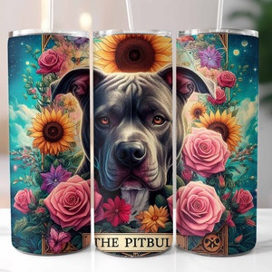 May include: A stainless steel tumbler with a colorful design featuring a pit bull dog, sunflowers, and roses. The tumbler has a black and white image of a pit bull dog with the text "The Pitbull" at the bottom.