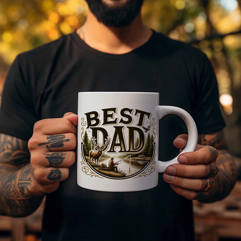 May include: White ceramic mug with a brown and green design featuring a deer, a man fishing, and the text "BEST DAD".