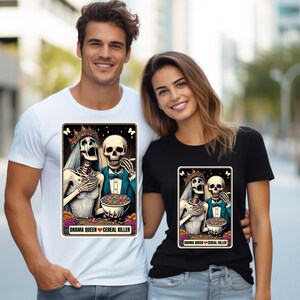 May include: Two skeletons dressed as a bride and groom are eating cereal from bowls. The bride is crying and the groom is smiling. The text on the card reads "Drama Queen Cereal Killer".