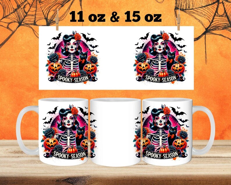 May include: Two white ceramic mugs with a black and white illustration of a woman with a skull face and a black cat. The illustration is surrounded by bats, roses, and pumpkins. The text "Spooky Season" is printed on the mugs.
