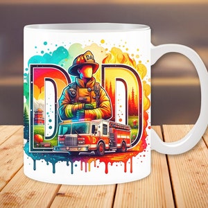 May include: White ceramic mug with a colorful illustration of a firefighter standing in front of a fire truck. The illustration is surrounded by a colorful watercolor-like background with the word "DAD" in large letters.