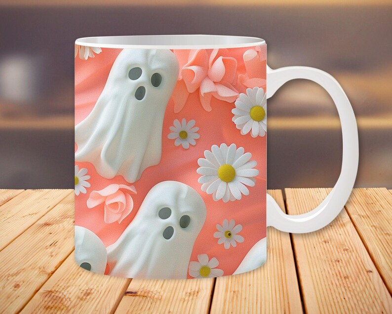 Pu&ograve; includere: Tazza in ceramica bianca con un design rosa e bianco con fantasmi e margherite.