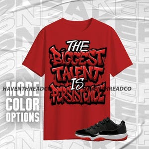 Camiseta unisex AJ 11 Low Bred &quot;Persistence Is Talent&quot; en rojo, negro y blanco, sudadera con capucha y zapatillas a juego, camisa de lona Bella.