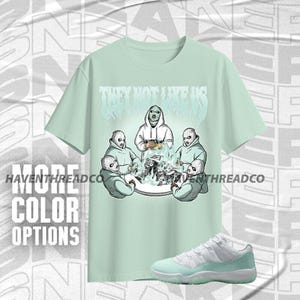 AJ 11 Low Igloo They Not Like Us Mint White Unisex T-Shirt, Hoodie, Sweatshirt To Match Sneaker, Bella Canvas Shirt