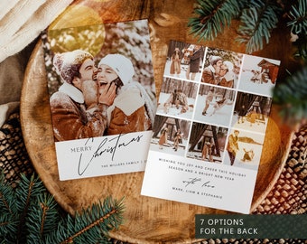 May include: Two Christmas cards with photos of a couple in winter clothing. One card says "Merry Christmas" and the other says "Wishing you joy and cheer this holiday season and a bright new year". The cards are on a wooden tray.