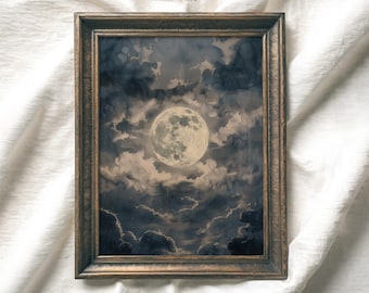 May include: A framed vintage print of a full moon in a cloudy sky. The moon is white and the clouds are dark gray. The frame is gold.
