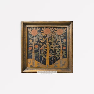 May include: A framed art print with a dark background and three stylized trees with orange and yellow flowers. The trees are outlined in gold and the background is a dark blue. The frame is a gold color with a raised edge. The text "ATLAS VINTAGE" is printed at the bottom of the frame.