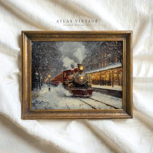 Peut inclure: Impression d'art vintage encadrée d'un train à vapeur rouge dans une gare enneigée. Le train et la gare sont éclairés par des lumières. L'œuvre est encadrée dans un cadre en bois doré. Le texte "ATLAS VINTAGE Curated Vintage Art" est en haut.