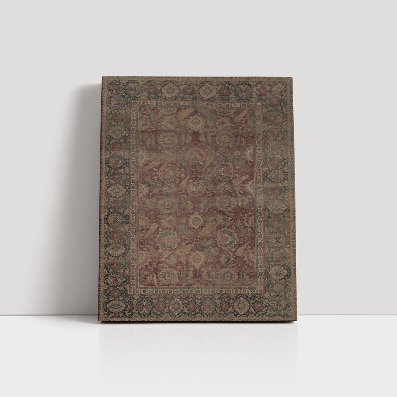 May include: A vintage rug with a red, brown, and blue floral pattern. The rug has a detailed border with intricate designs.