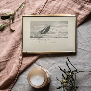 Rental house decor sailboat art